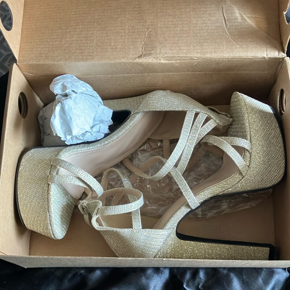 Beautiful silver glitter high heels.